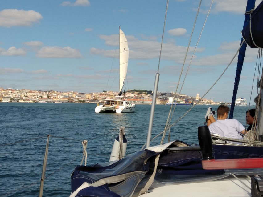 Lisbon: Sailing Tour with Wine and Snacks - Christ the King and the scale of the 25 de Abril Bridge