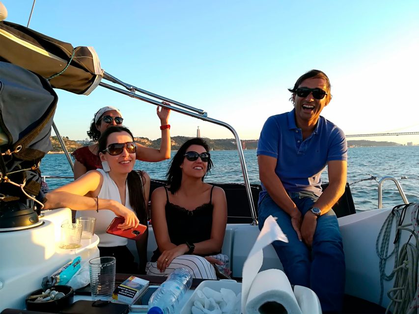 Lisbon: Sailing Tour with Wine and Snacks - Alfama from below the hills