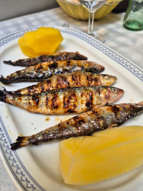 Lisbon Small-Group Food & Wine Tour Eat & Drink like a Local - Ginjinha and the flavors of central Lisbon