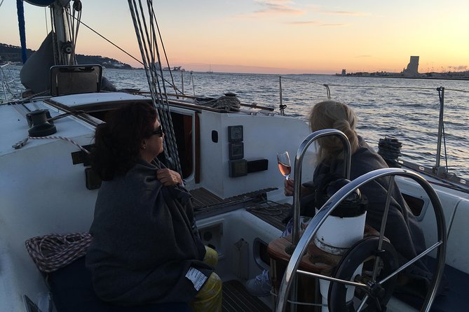 Lisbon Sunset Sailing Tour with White or Rosé Wine and Snacks - Boat comfort, weather, and what to bring