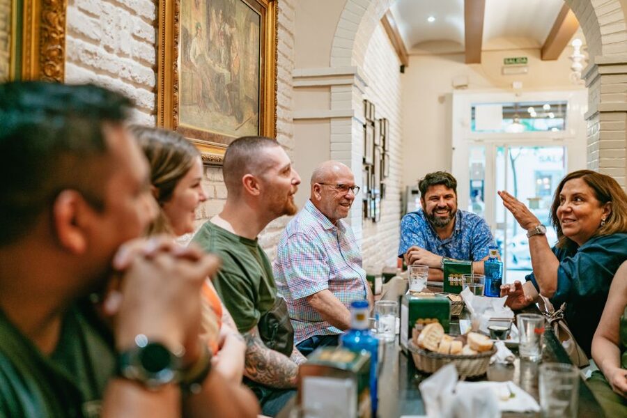 Madrid: Food & Wine Tour with 10 Tapas & 4 Drinks Included - Stop two: the neighborhood bar