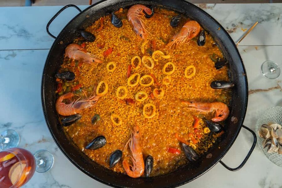 Madrid: Paella & Sangria Classes – Seafood, Chicken or Vegan - Tapas while the paella finishes cooking