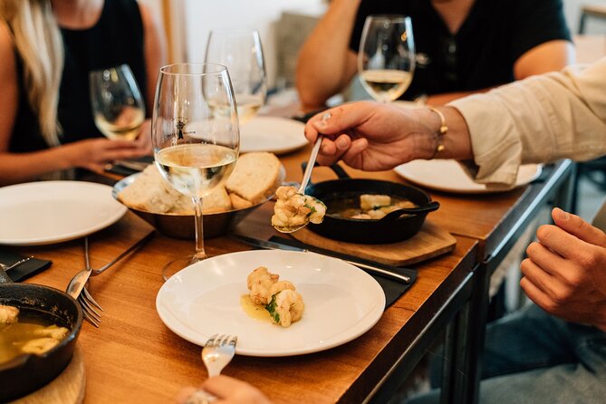 Madrid Tapas & Wine Tour with Rooftop Views and Local Guide - What the drinks add to the price