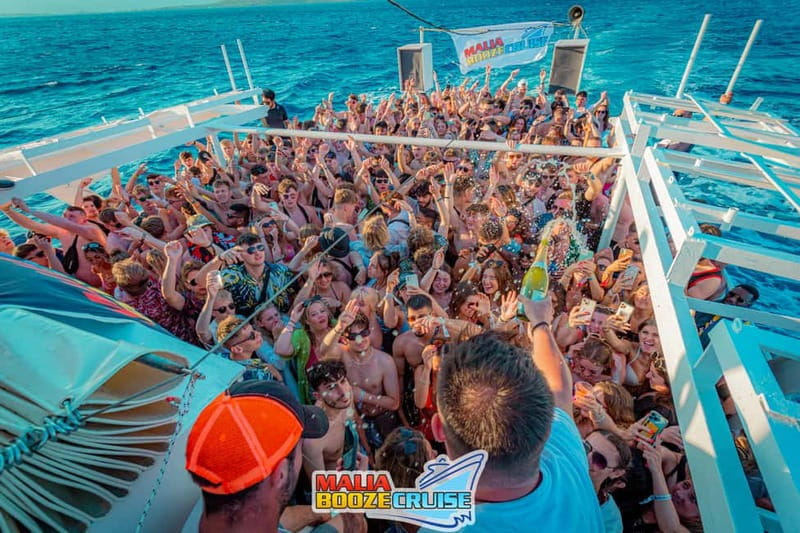 Malia: Booze Cruise Boat Party with Live Dj - Lunch, drinks, photos, and what you really pay for