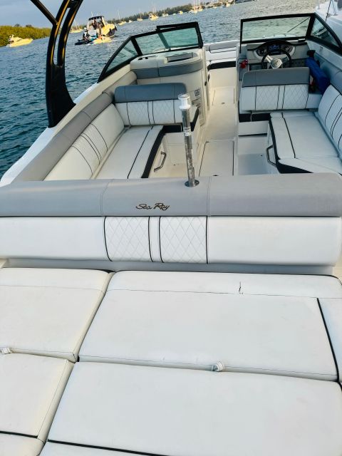 Miami: Guided Boat Tour with Champagne - Captains who shape the experience