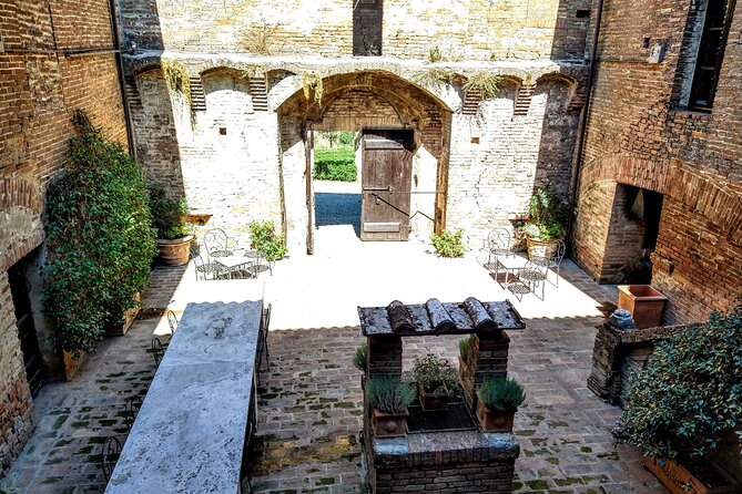 Montalcino: Brunello Wine Tasting & Lunch in a Tuscan Castle - Inside the castle and barrel room