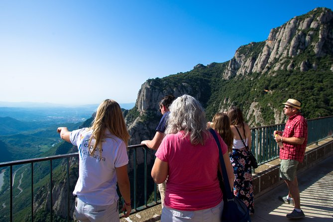 Montserrat & Winery Visit Tour with Traditional Farmhouse Lunch - Touring a family winery in Pacs del Penedès