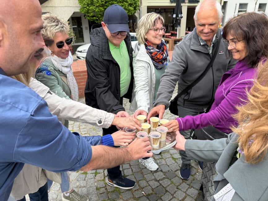 Munich: Viktualienmarkt Food Tasting Tour in German - Fruit and juice keep the tasting from feeling too heavy