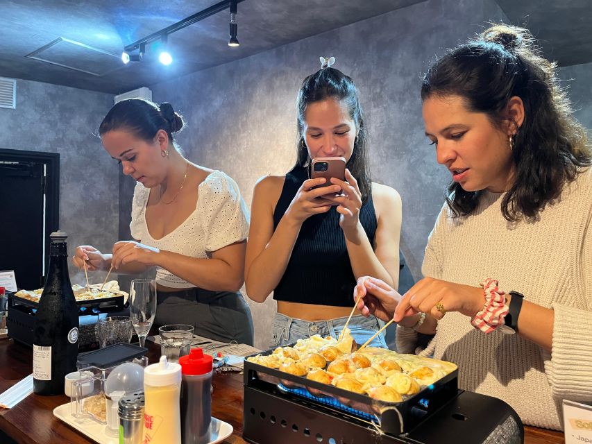 Osaka Sake Tasting with Takoyaki Cooking - Timing, language, and practical details