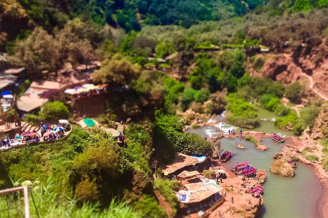 Ouzoud Waterfalls Guided Hike and Boat Trip from Marrakech - The boat ride beneath the falls