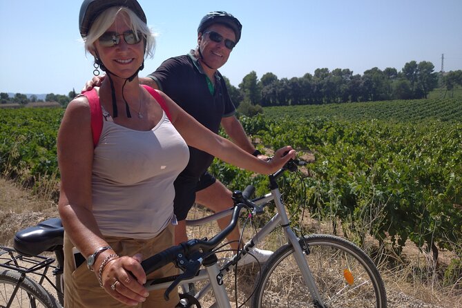 Paella Class, Winery & Bike Ride - Free Hotel Pickup from Sitges - Cycling through Catalan wine country