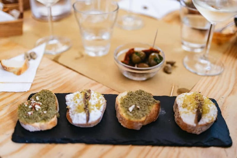 Palermo: Wine Tasting with Snacks at Bottega Monteleone - The hosts make the difference