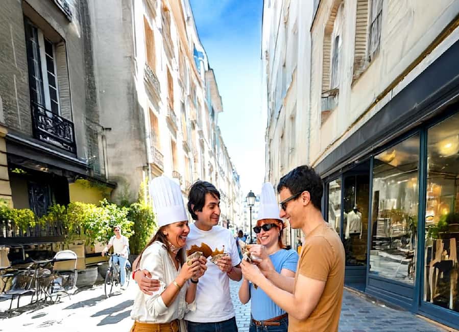 Paris: Champagne and Oysters Food Tour - Oysters and local wine at the first stop