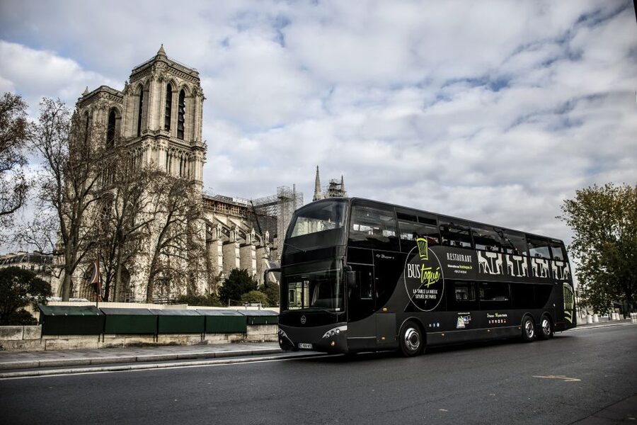 Paris: Champs Elysées Bus Toqué w/Lunch & Glass of Champagne - Lunch with a view instead of a crowded café
