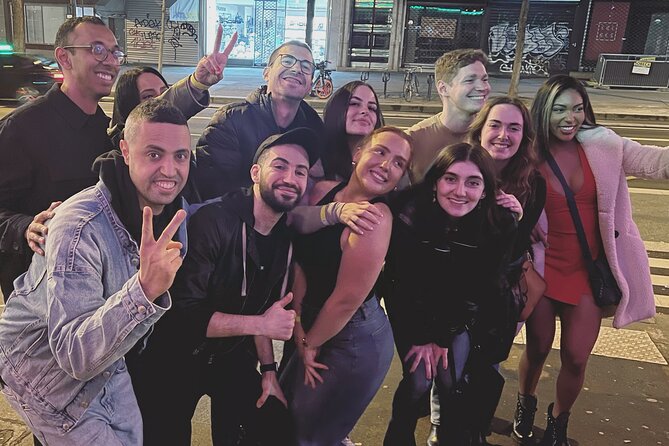 Paris: City Center Guided Pub Crawl with Shots & Club Entry - The walk to Porte-Saint-Denis
