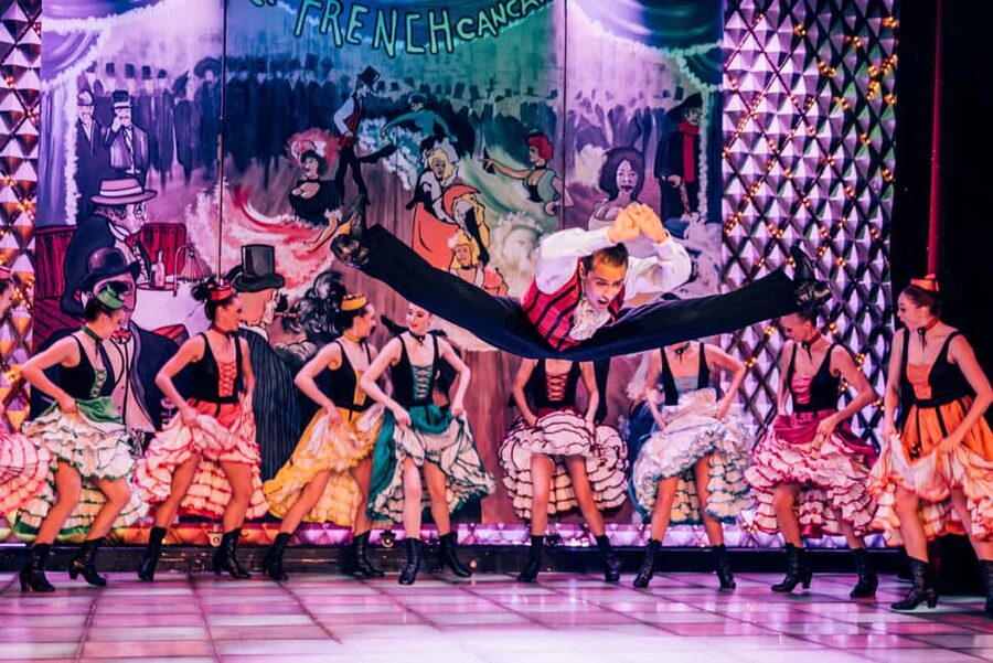 Paris: La Nouvelle Eve Cabaret Show with Champagne - Champagne, tables, and the value of $116