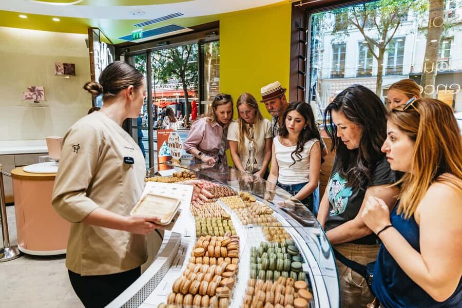Paris: Walking Food Tour with Cheese, Wine and Delicacies - The first tastes: cheese, bread, and French food customs
