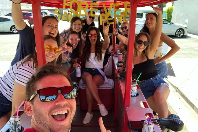 Pedal Bar Crawl of Old Town Scottsdale - Pedaling past Old Town buildings and Camelback Mountain