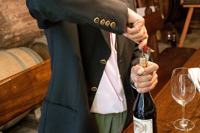 Piedmont Winery Tour: Taste Barolo, Barbaresco & Traditional Food - Walking through a working Piedmont vineyard