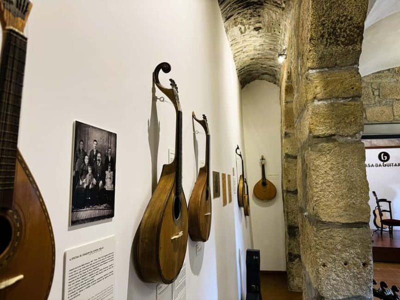 Porto: Fado & Port Wine in Traditional Portuguese Music Shop - A glass of Port in the middle