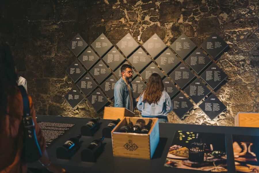 Porto: Port Cellar Visit and Wine Tasting at Fonseca - The cellars, displays, and scent game