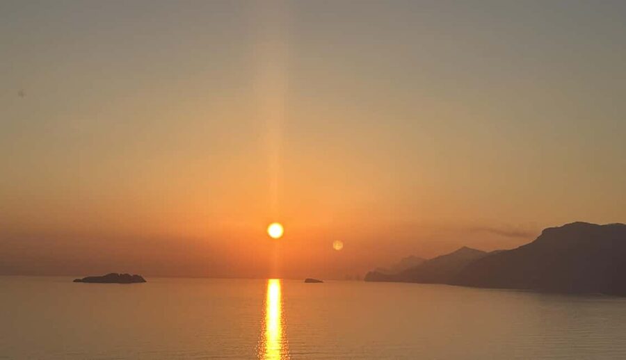 Positano: Sunset Group Boat Tour Amalfi Coast with Prosecco - Passing Praiano and the coastal cliffs