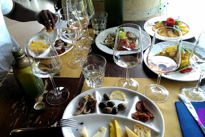 Private 6-Hour Tour of Three Etna Wineries with food&wine tasting - Third stop: Reds, whites, and a local cellar atmosphere