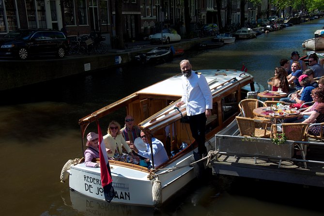 Private Champagne Canal Cruise in Amsterdam - The Amstel River, locks, and Amstel Hotel