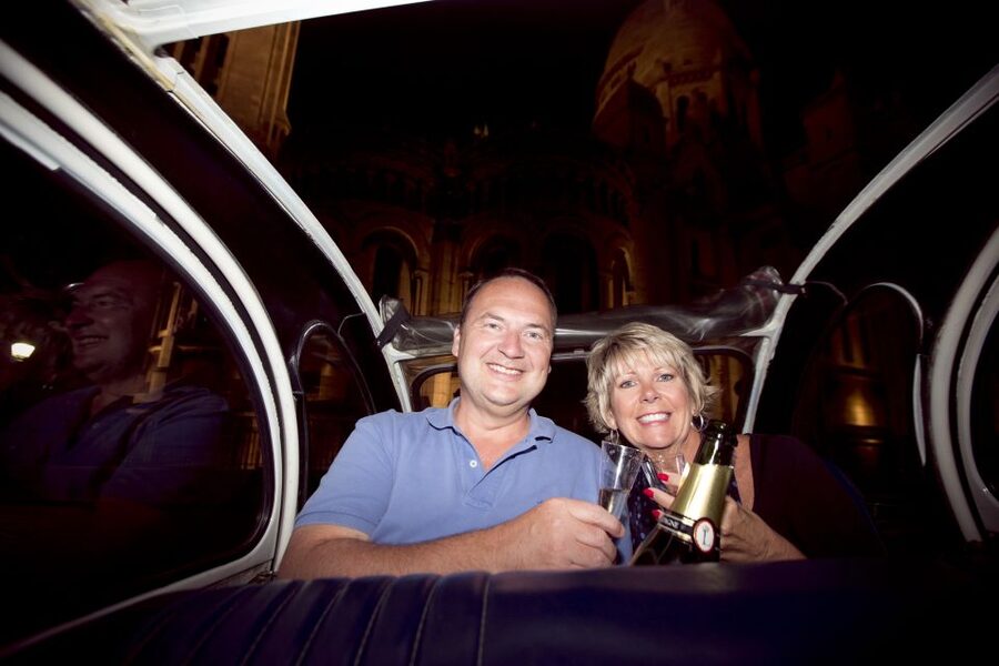 Private tour of Paris by Night with Champagne - The Louvre, Notre Dame, and Opera Garnier by night