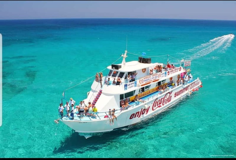 Protaras Blue Lagoon Sunset Tour with Pizza & Champagne - Passing Fig Tree Bay and Konnos Beach