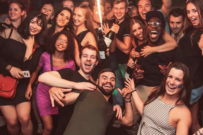 Pub Crawl Barcelona by EVOLVE The BEST night experience - Moving through Plaça Reial and La Rambla