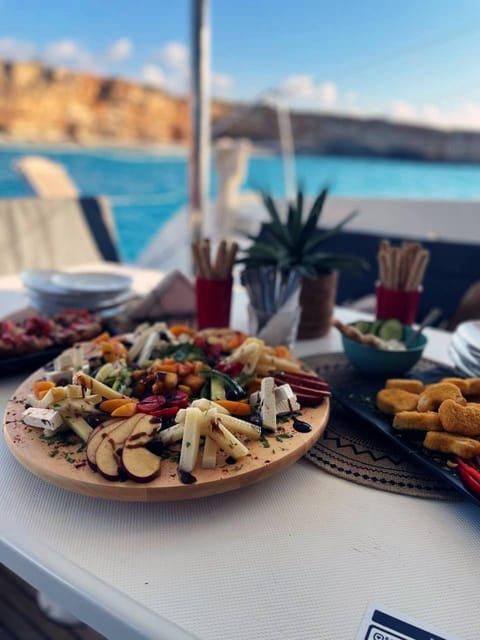 Rethymno: Sunset Catamaran Cruise - Sushi & Open Bar - Sushi, Cretan snacks, and the open bar