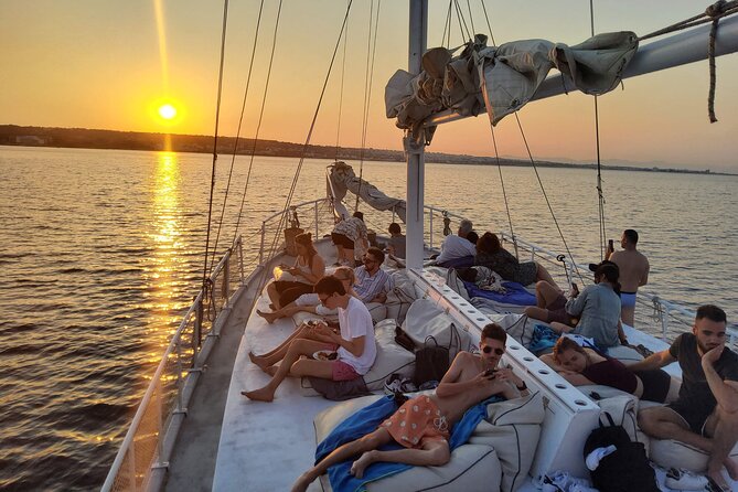 Rhodes Exclusive Sunset tour Cocktail Open bar Gourmet Live Music - Greek buffet service, with a casual onboard feel