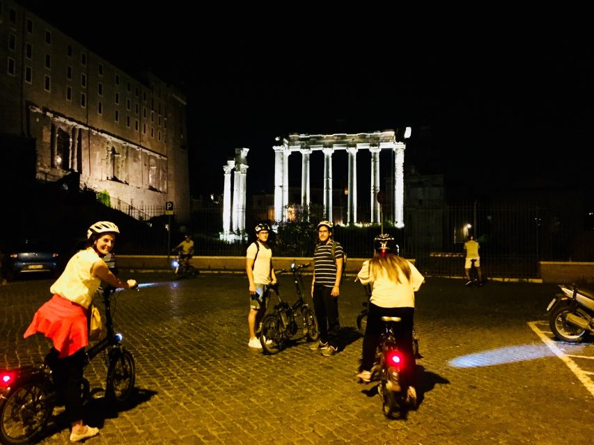 Rome: E-Bike Night Tour with Food and Wine Tasting - The food and wine stop near Saint Peter’s