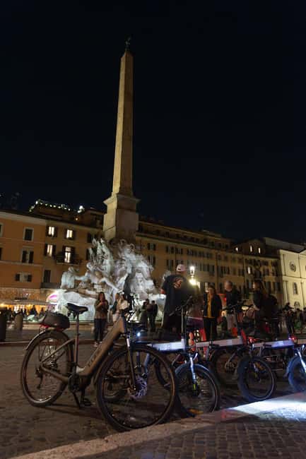 Rome: E-Bike Night Tour with Food and Wine Tasting - Trajan’s Market and the Colosseum finish