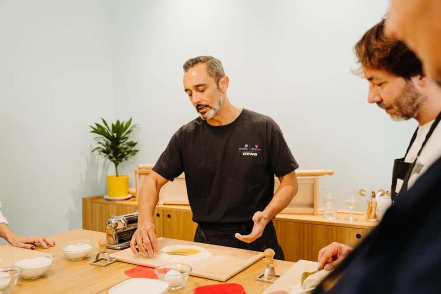 Rome: Fresh Pasta-Making Class with Wine and Gelato - Sitting down to eat what you made