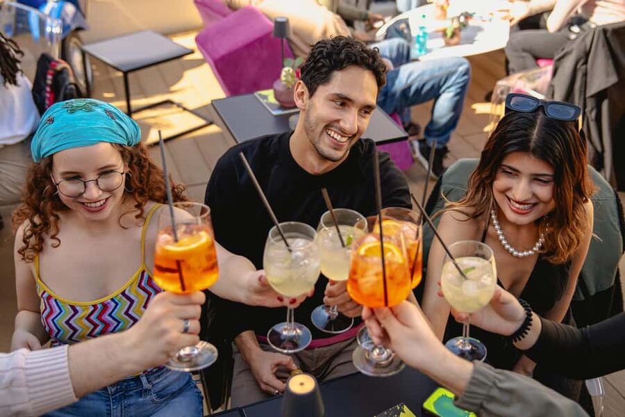Rome: Nightlife Tour & Guided Bar Crawl with Games & Karaoke - Walking through Rione Monti after dark