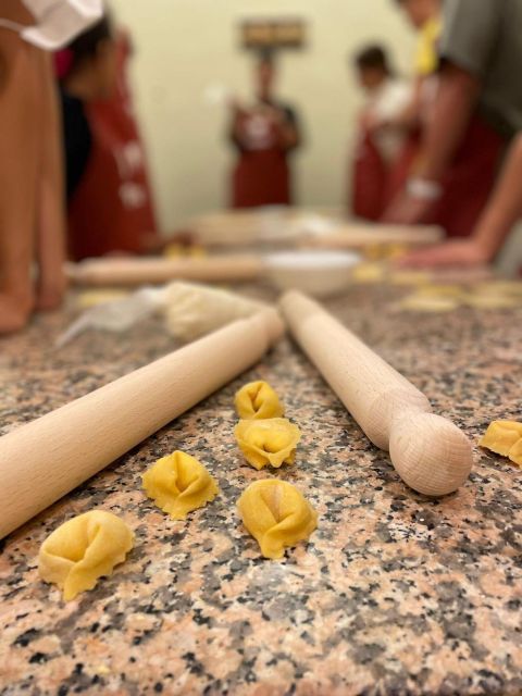 Rome: Pasta Making Class with Wine, Limoncello, and Dessert - The instructors shape the evening