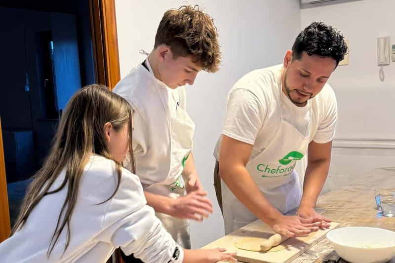 Rome: Rooftop Cooking Class with Wine Tasting near Vatican - Rolling and cutting fresh fettuccine