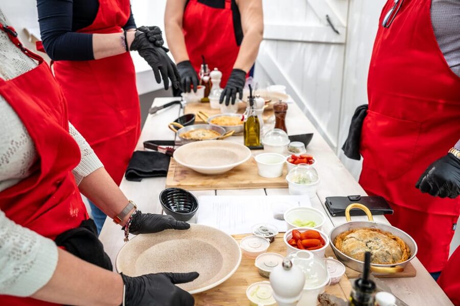 Santorini: Cooking Class with Lunch and Wine Tasting - Cooking beside Kamari’s Black Beach
