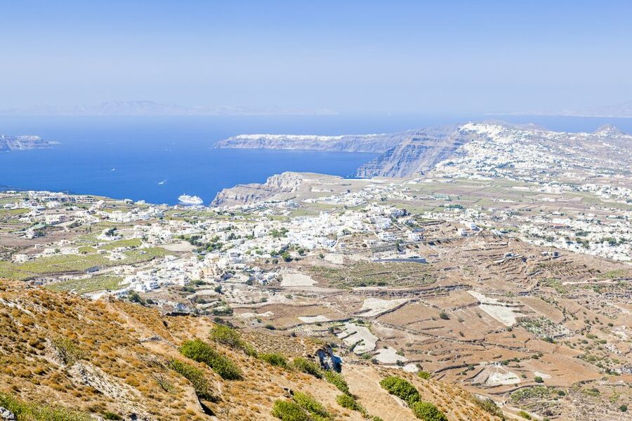Santorini: Top Sights Day Trip, Wine Tasting, & Oia Sunset - Emporio, arches, and a small Venetian fortress