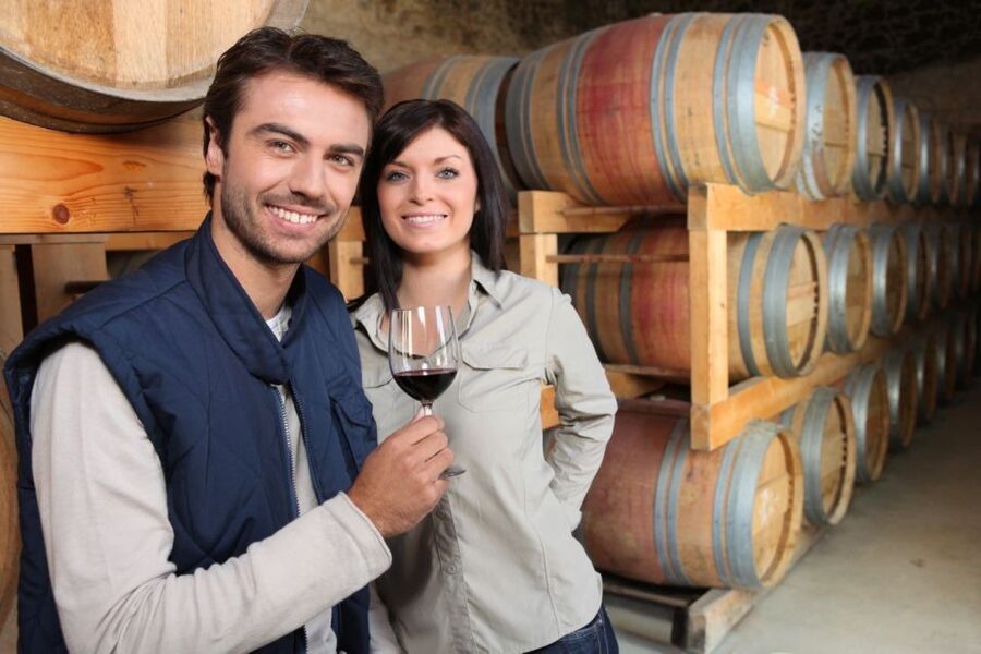 Santorini: Tour of Wineries with Wine Tasting & Food - First winery: cellar work, local snacks, and island tradition