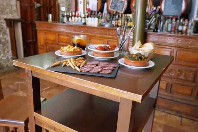 Sevilla Food Tour: Tapas, Wine, History & Traditions - Walking the historic center between bites