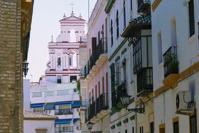 Sevilla Food Tour: Tapas, Wine, History & Traditions - Los Soportales: old-fashioned food and a first drink