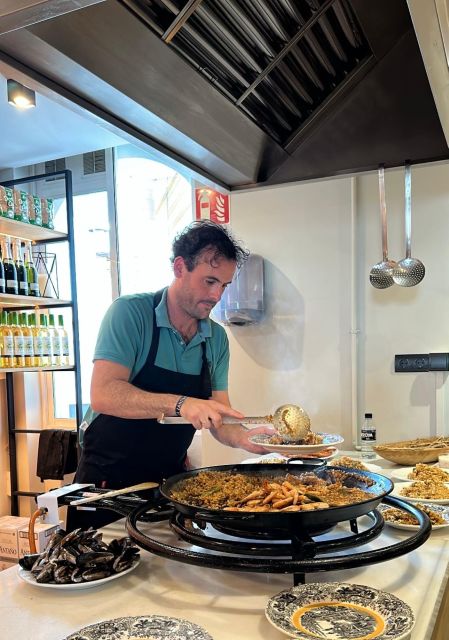 Seville: Paella-Cooking Experience with Sangria & Full Meal - Beginning with Andalusian wine and small bites
