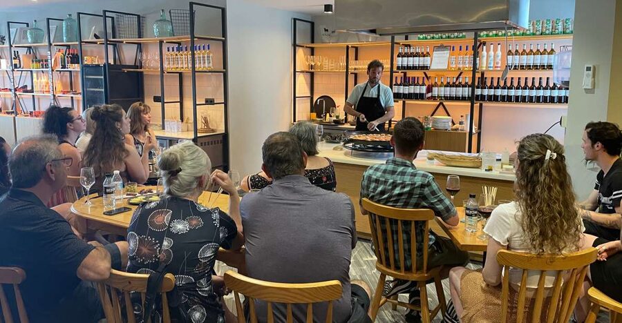 Seville: Paella-Cooking Experience with Sangria & Full Meal - Watching the paella take shape