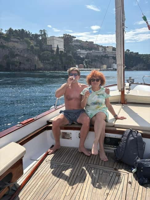 Sorrento: Boat Coastal Cruise with Swim and Limoncello - Marina di Puolo and the view toward Vesuvius