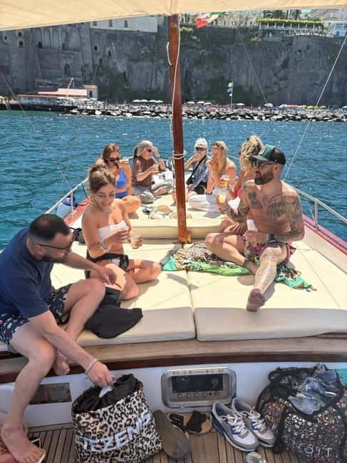 Sorrento: Boat Coastal Cruise with Swim and Limoncello - Sant’Agnello, Marina Piccola, and the changing shoreline