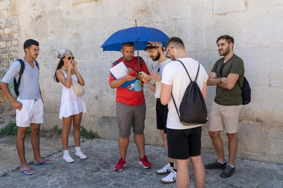 Split: Krka Waterfalls With Boat Cruise, Wine and Olive Oil - Walking the wooden paths at Skradinski buk