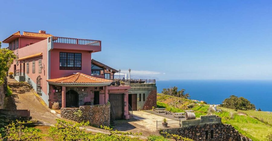 Tacoronte: Guided Winery Tour with Wine and Cheese Tastings - Entering a winery run by the Monje family since 1750